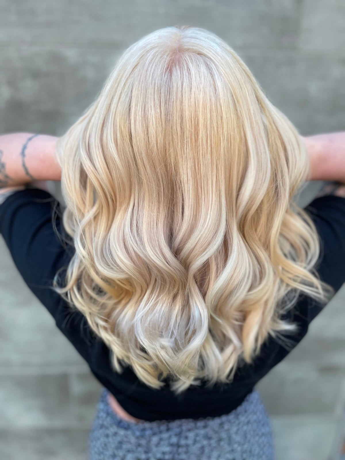 Platinum card with long layered haircut